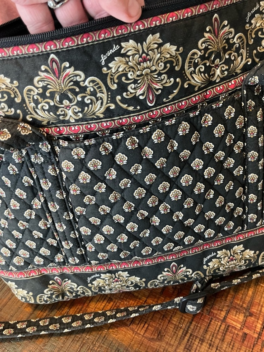 Larenda Black Quilted Crossbody Bag with Gold and Red Accents